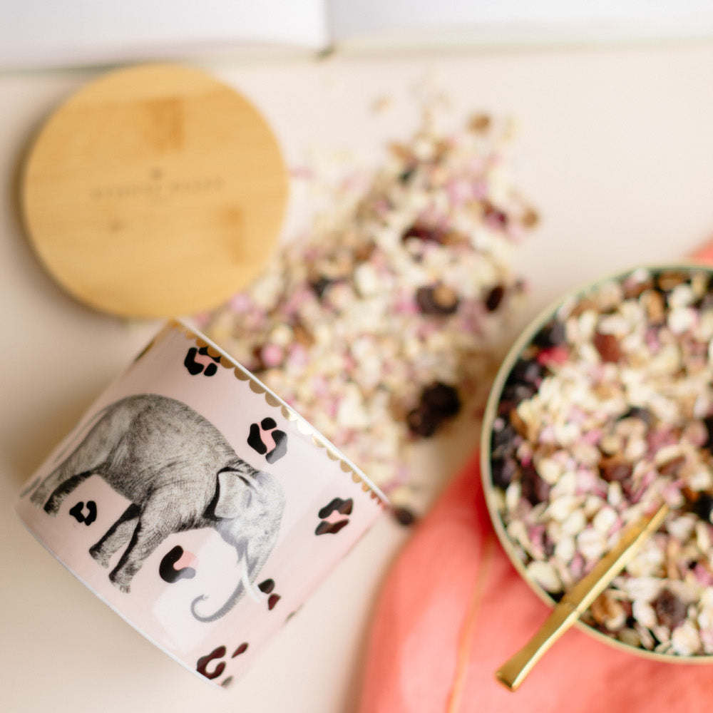 Elephant storage jar spilling muesli