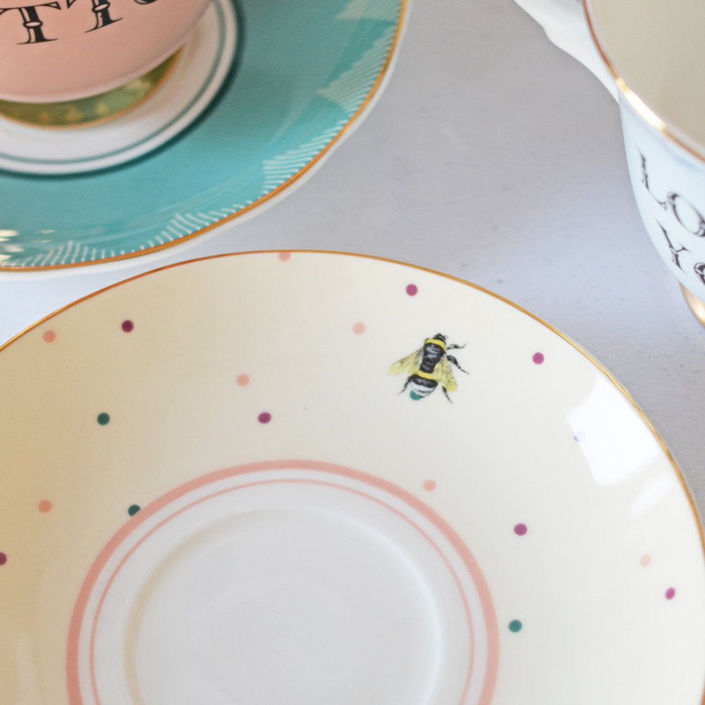 Bee emblem on saucer
